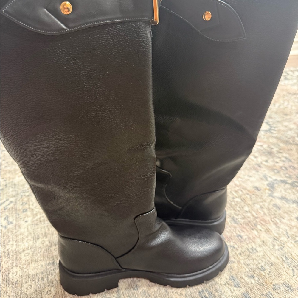 Black Leather Knee-High Boots with Gold Accents